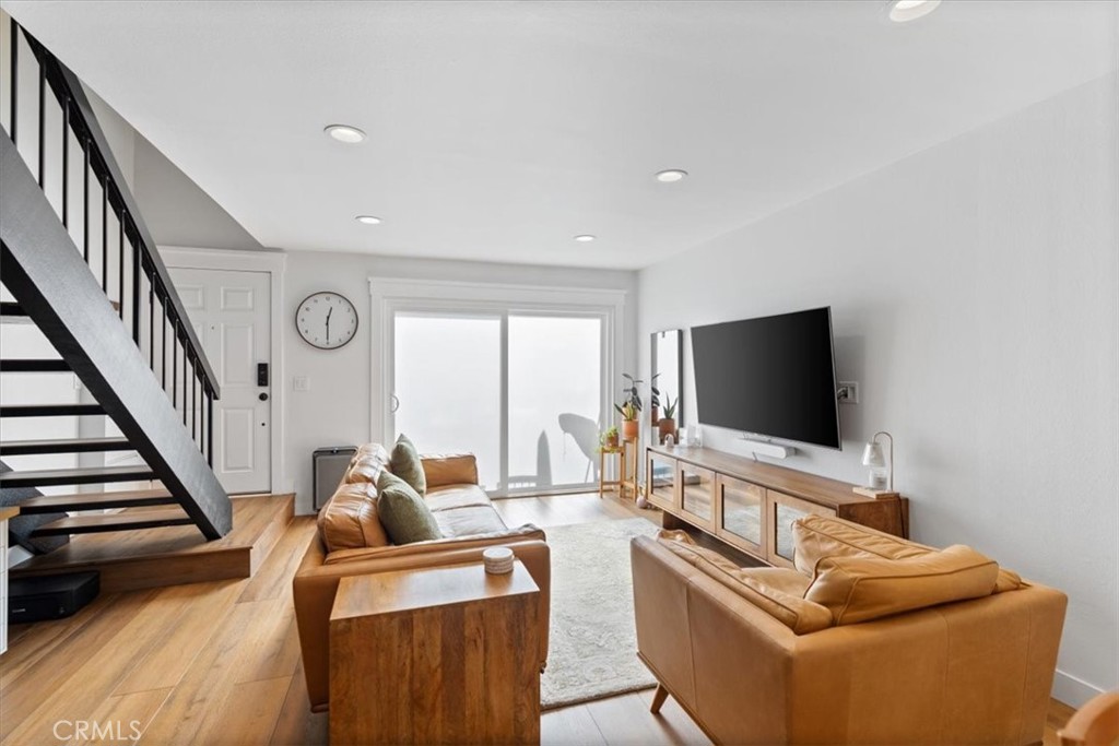 16873 Donwest Tustin, CA 92780 - Photo 7 of 42 a living room with furniture and a flat screen tv