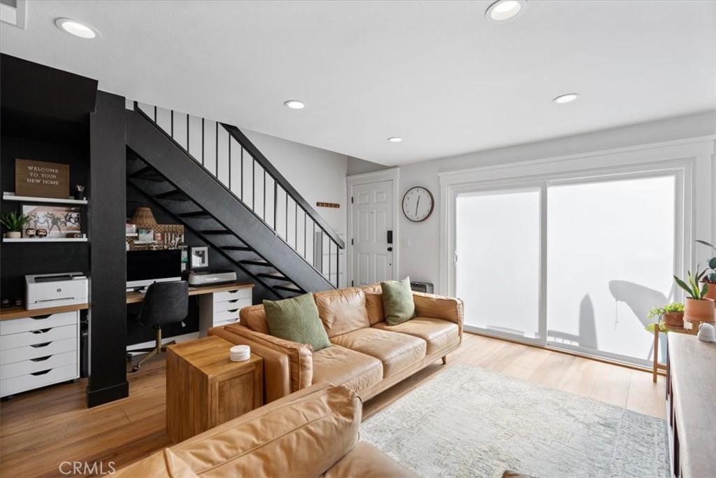 16873 Donwest Tustin, CA 92780 - Photo 9 of 42 a living room with furniture and a flat screen tv