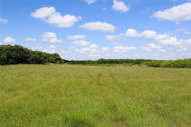 a view of lake with sunset