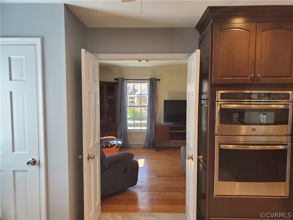 12901 Silver Crest Road Chester, VA 23831 - Photo 12 of 42 a living room with stainless steel appliances furniture and a view of a livingroom