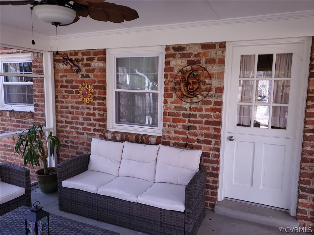 12901 Silver Crest Road Chester, VA 23831 - Photo 15 of 42 a view of a livingroom with furniture and windows