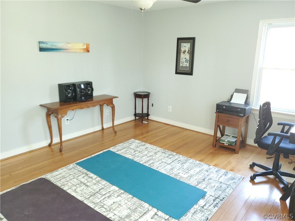 12901 Silver Crest Road Chester, VA 23831 - Photo 23 of 42 a bedroom with a bed and a workspace