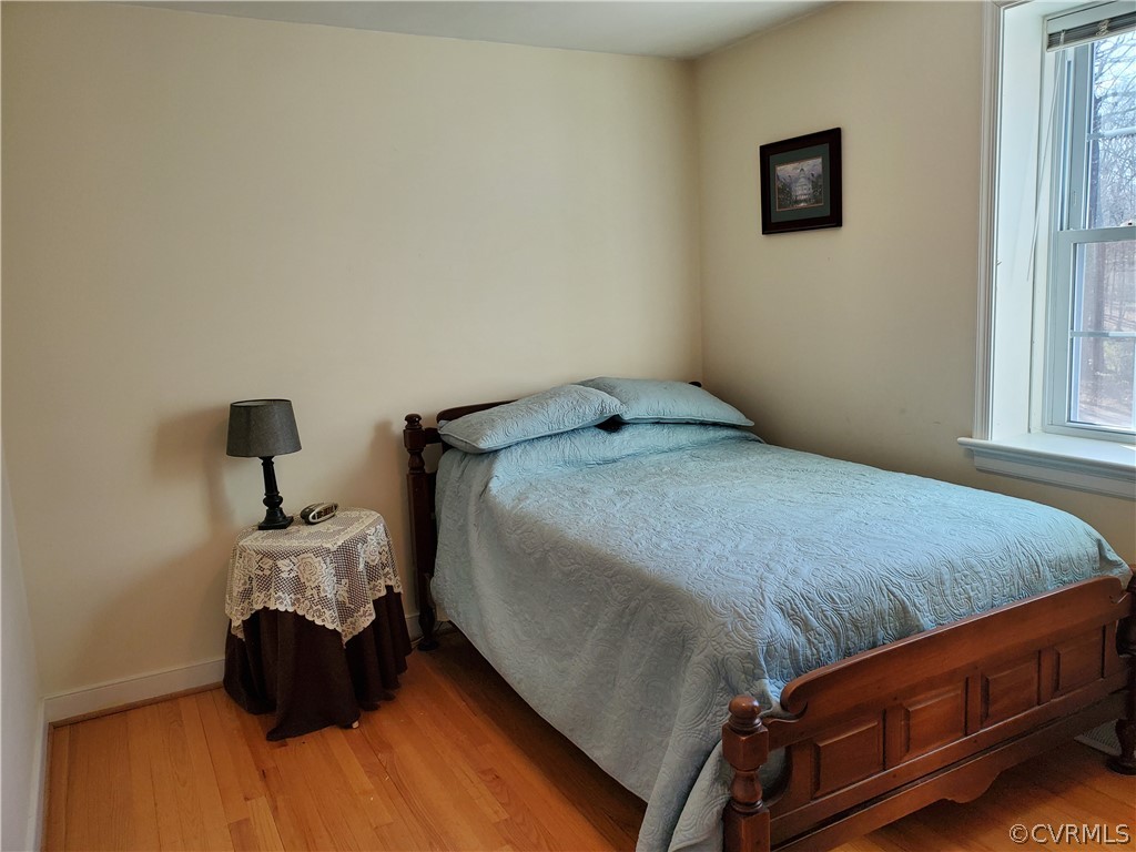 12901 Silver Crest Road Chester, VA 23831 - Photo 24 of 42 a bedroom with a bed and window