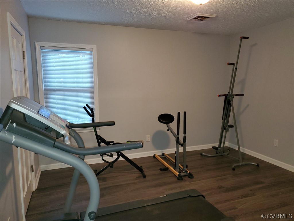 12901 Silver Crest Road Chester, VA 23831 - Photo 29 of 42 a view of a room with gym equipment