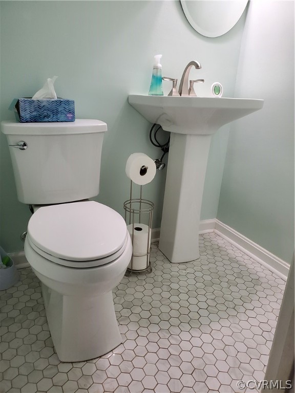 12901 Silver Crest Road Chester, VA 23831 - Photo 31 of 42 a bathroom with a sink and a toilet