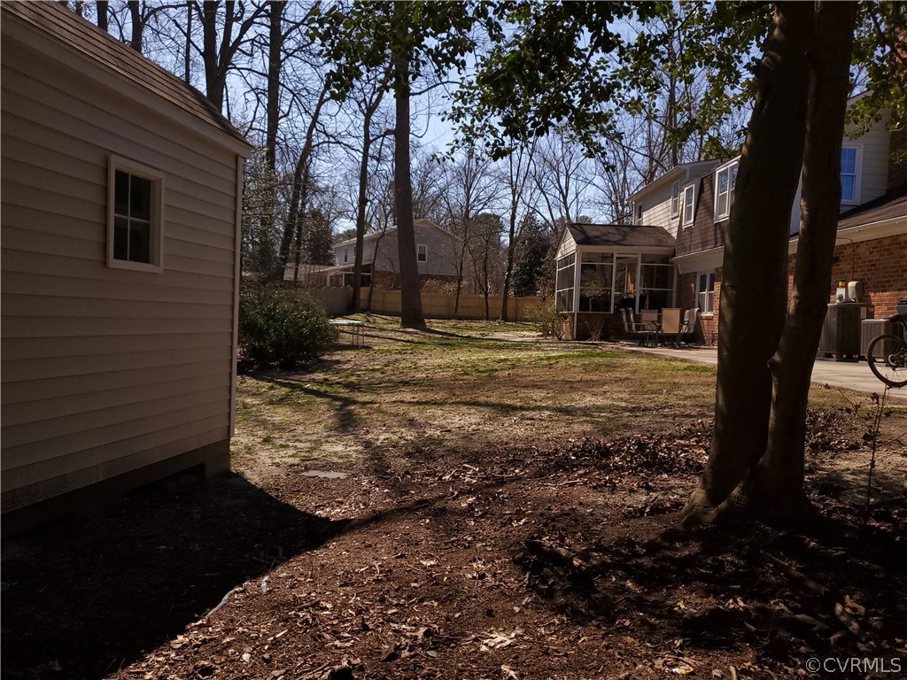 12901 Silver Crest Road Chester, VA 23831 - Photo 5 of 42 a view of back yard of the house