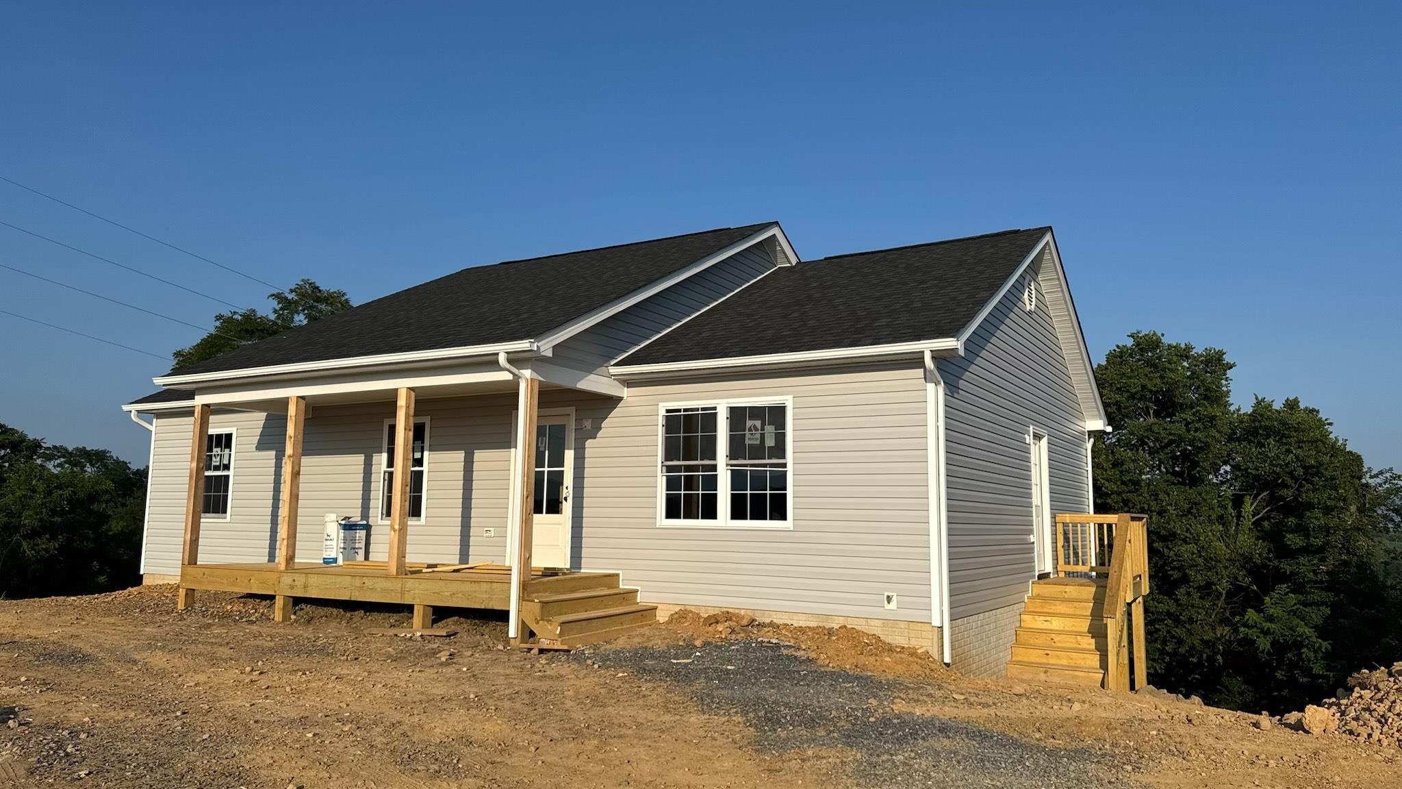 a front view of a house with a garage