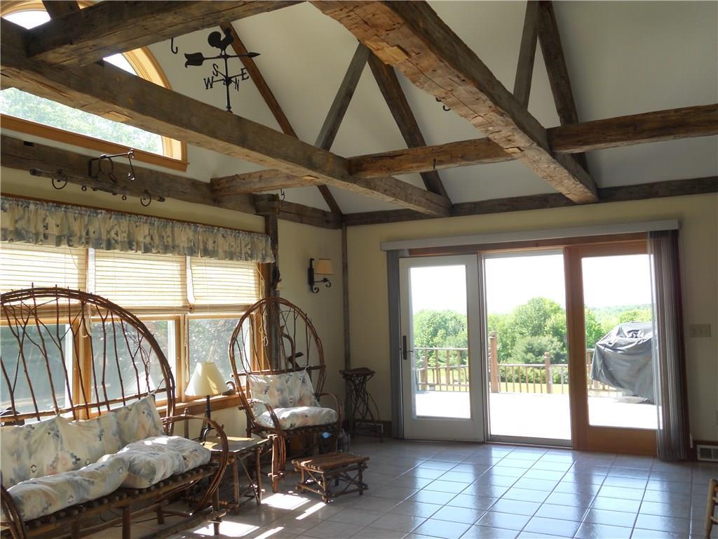 173 Ward Hill Road Madison, ME 04950 - Photo 12 of 35 Sunroom with sliders to expansive...