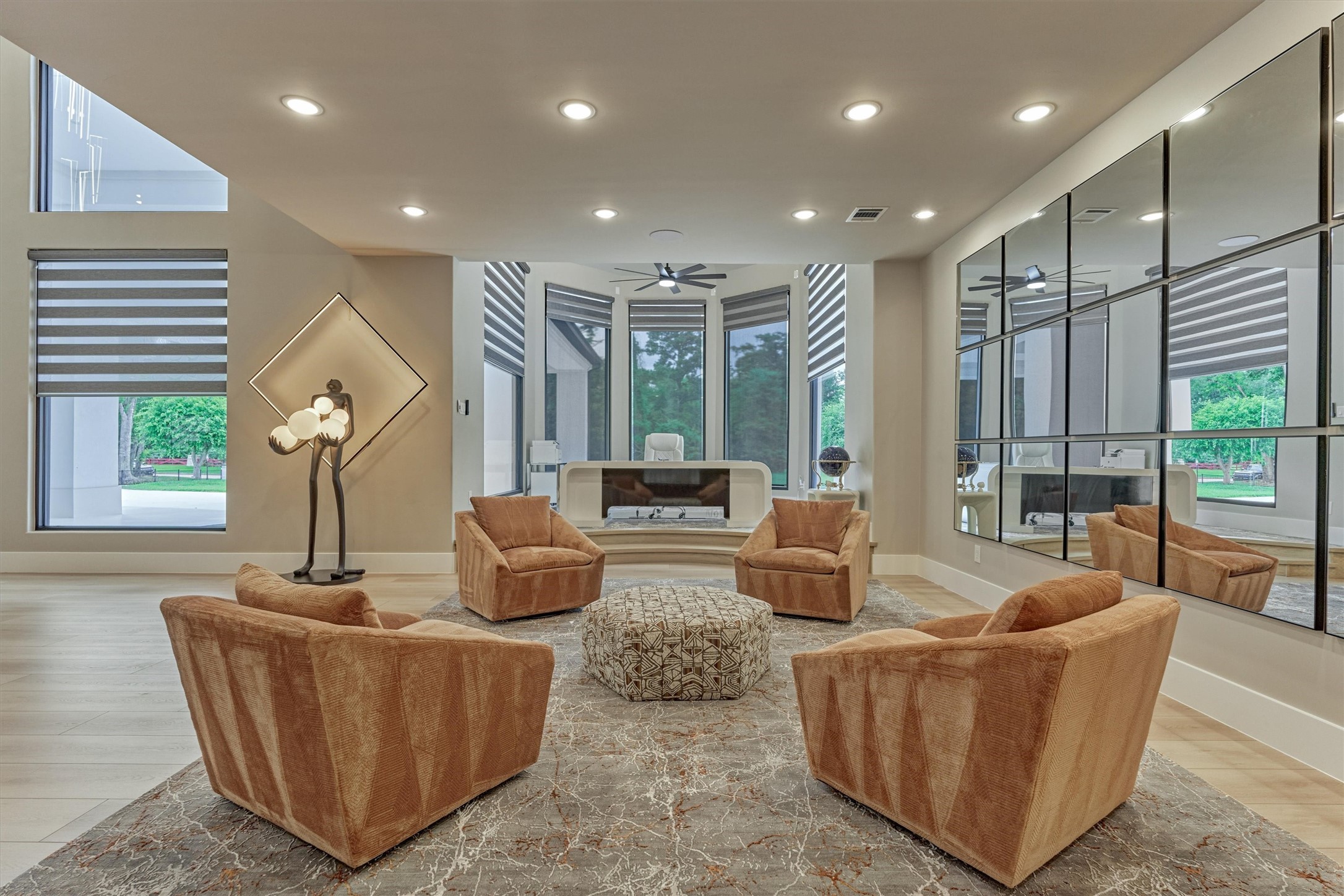 1907 Woerner Road Houston, TX 77090 - Photo 6 of 50 The formal living room opens to an elevated home office, enhancing the home's sophisticated contemporary appeal.