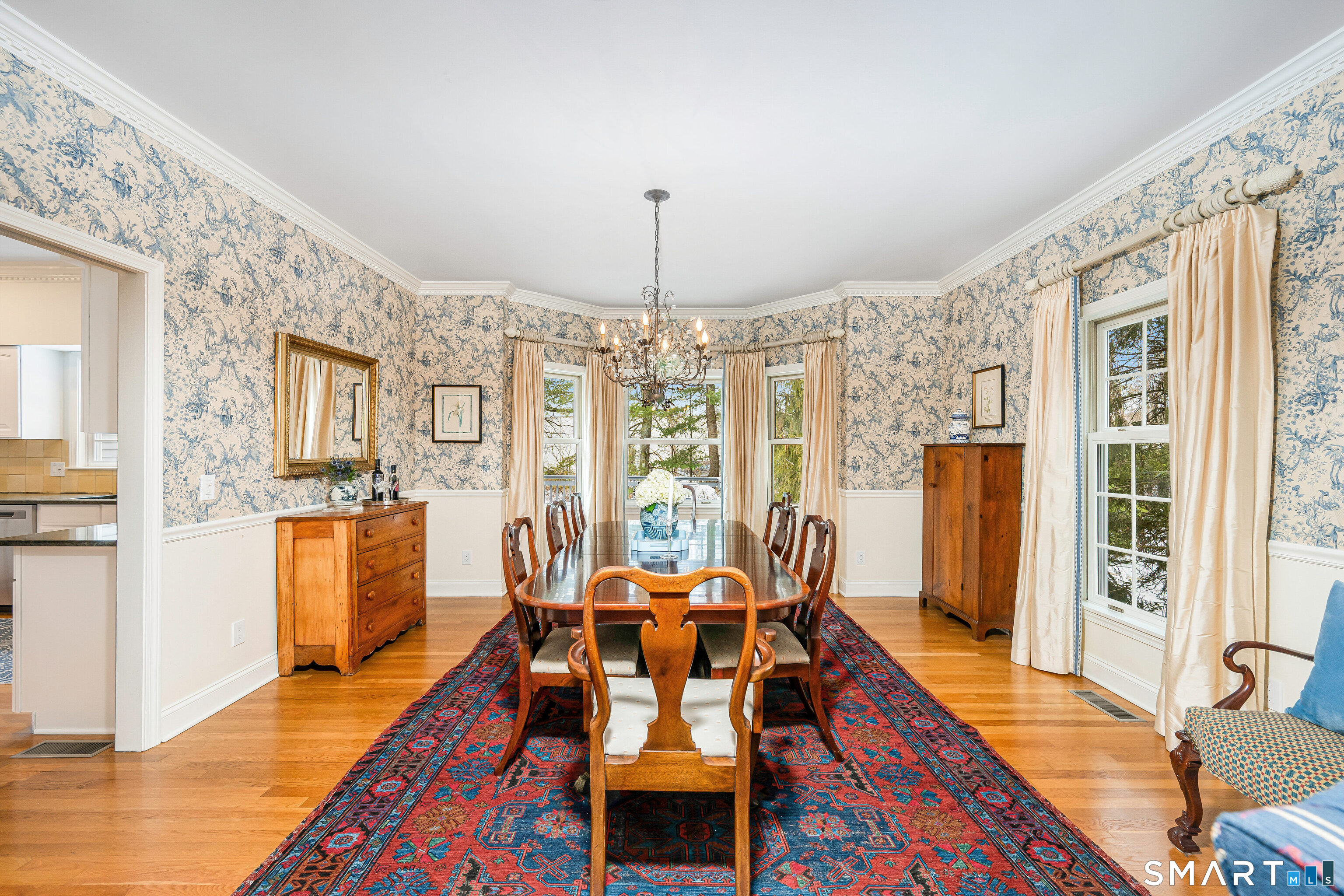 43 Phillips Lane Darien, CT 06820 - Photo 4 of 29 a view of a dining room with furniture window and wooden floor