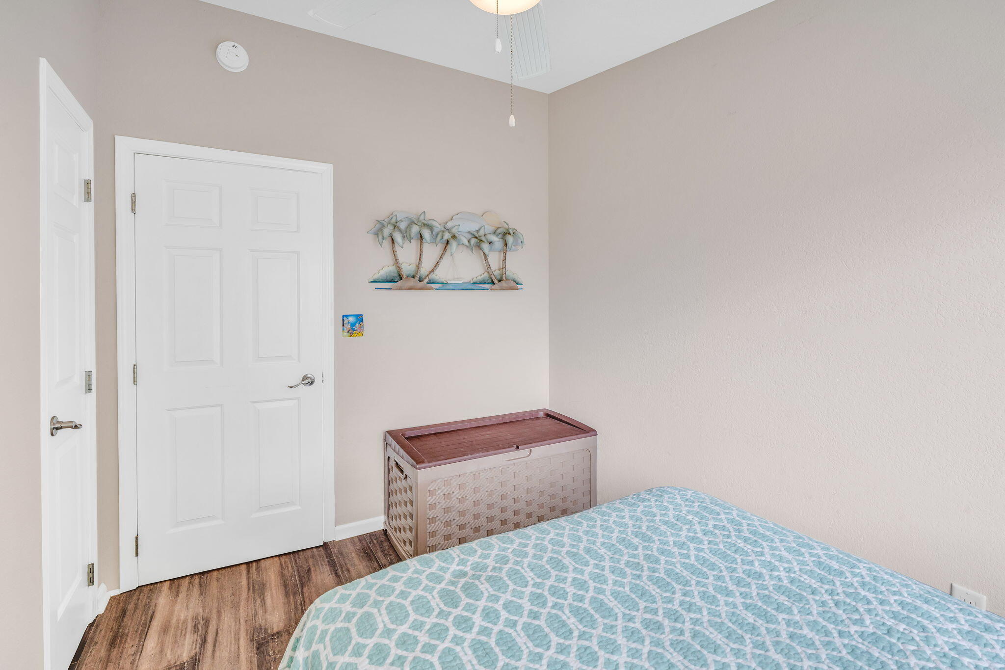 28571 Buccaneer Road Summerland Key, FL 33042 - Photo 16 of 40 a bedroom with a bed and a painting on the wall