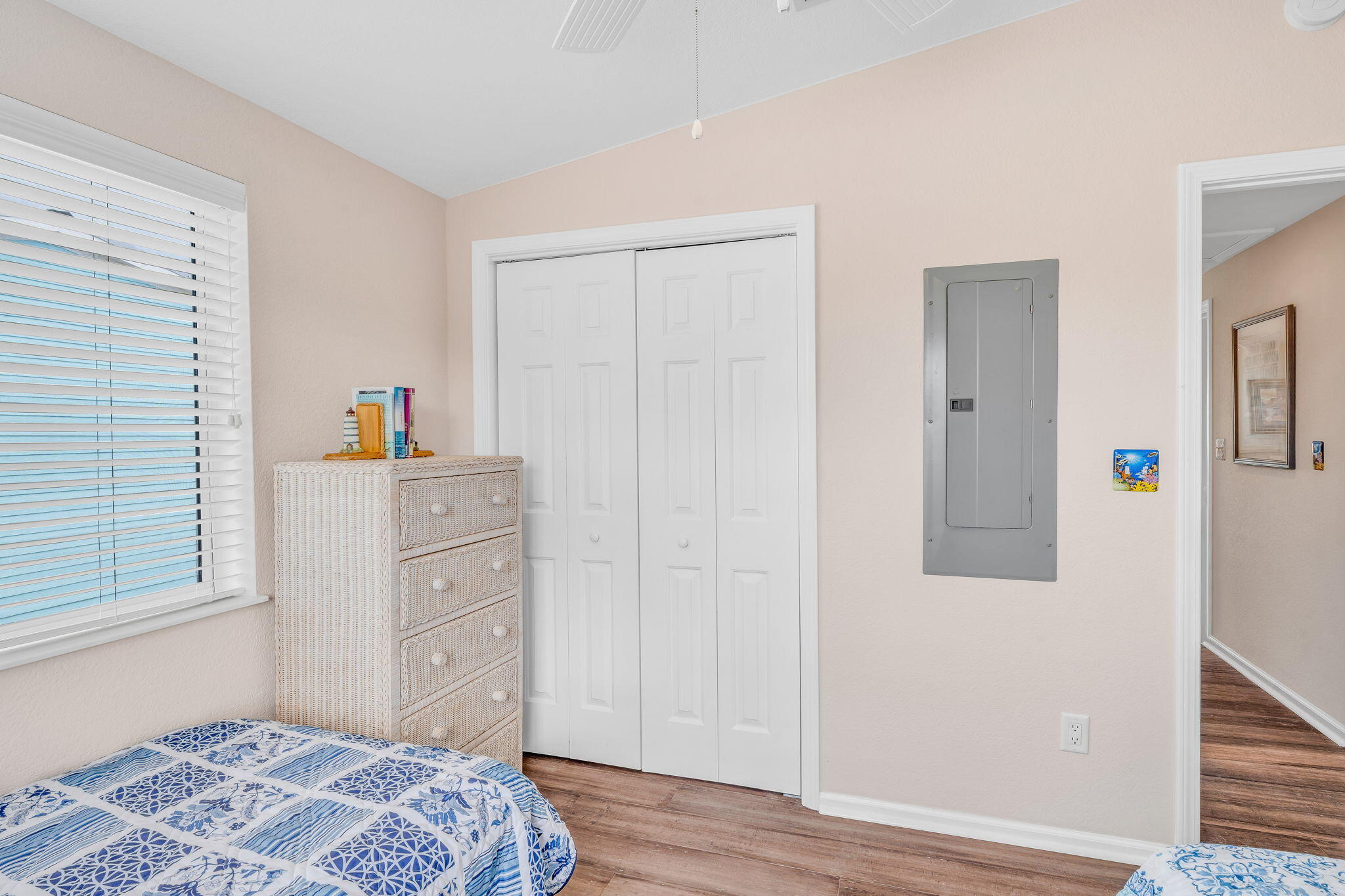 28571 Buccaneer Road Summerland Key, FL 33042 - Photo 19 of 40 a bedroom with a bed and wooden floor