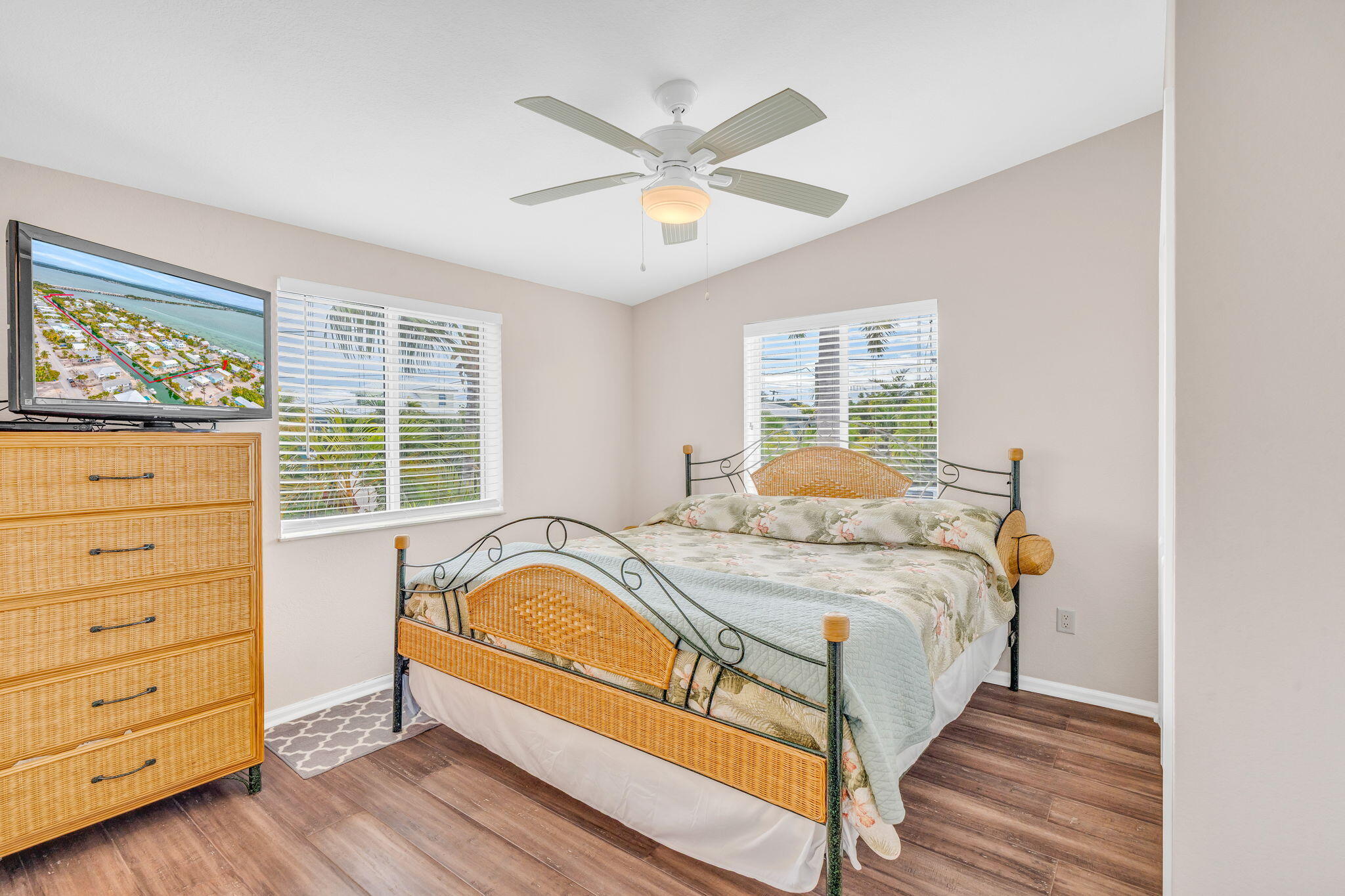28571 Buccaneer Road Summerland Key, FL 33042 - Photo 20 of 40 a bedroom with a bed and window