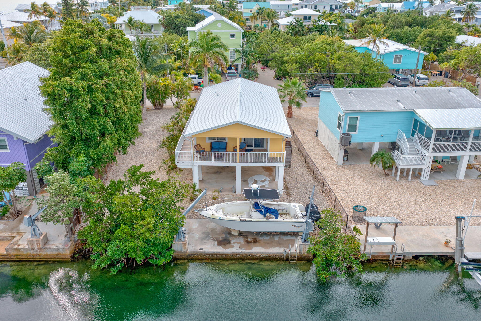 28571 Buccaneer Road Summerland Key, FL 33042 - Photo 24 of 40 an aerial view of a house with a garden and plants