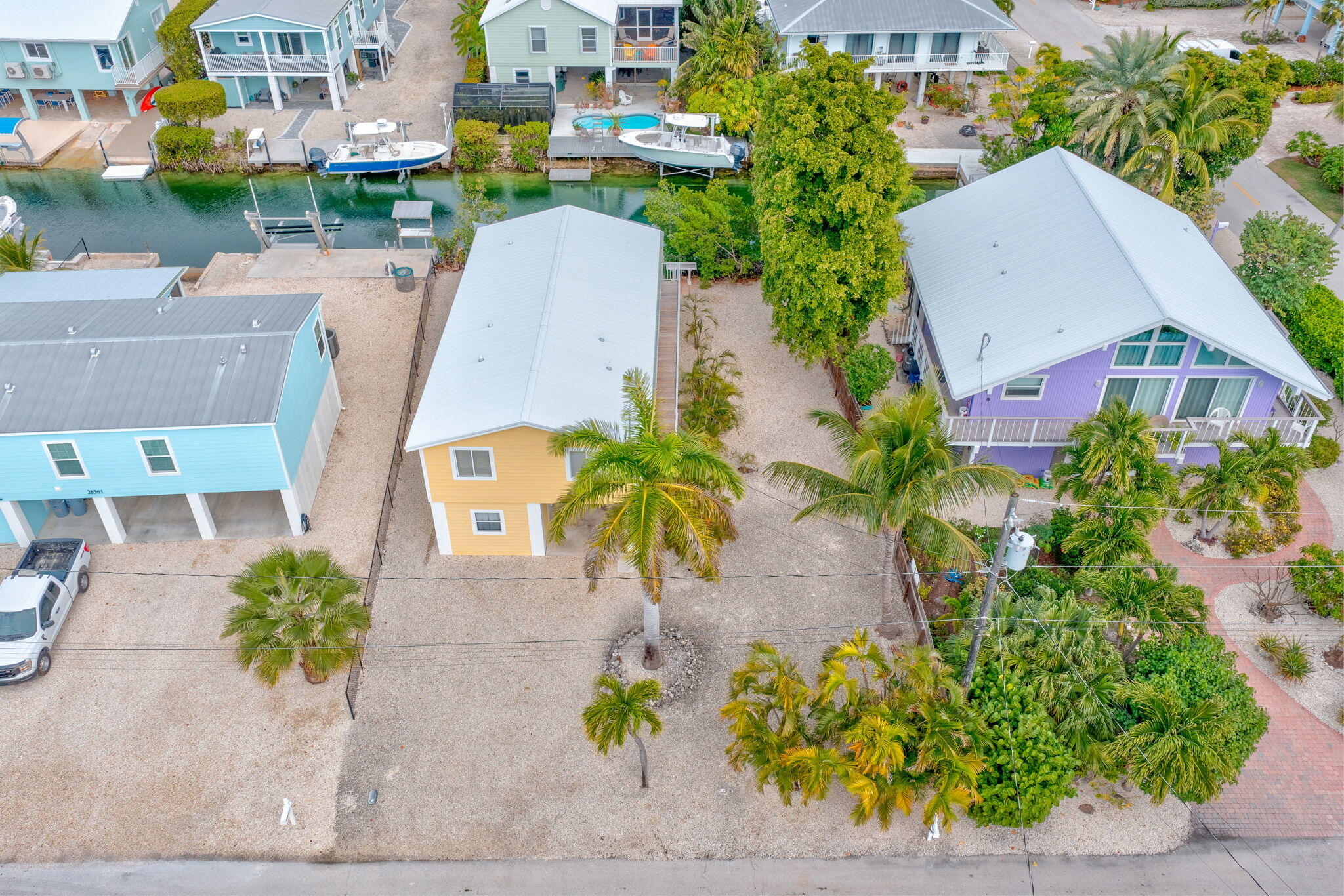 28571 Buccaneer Road Summerland Key, FL 33042 - Photo 26 of 40 an aerial view of multiple houses with yard