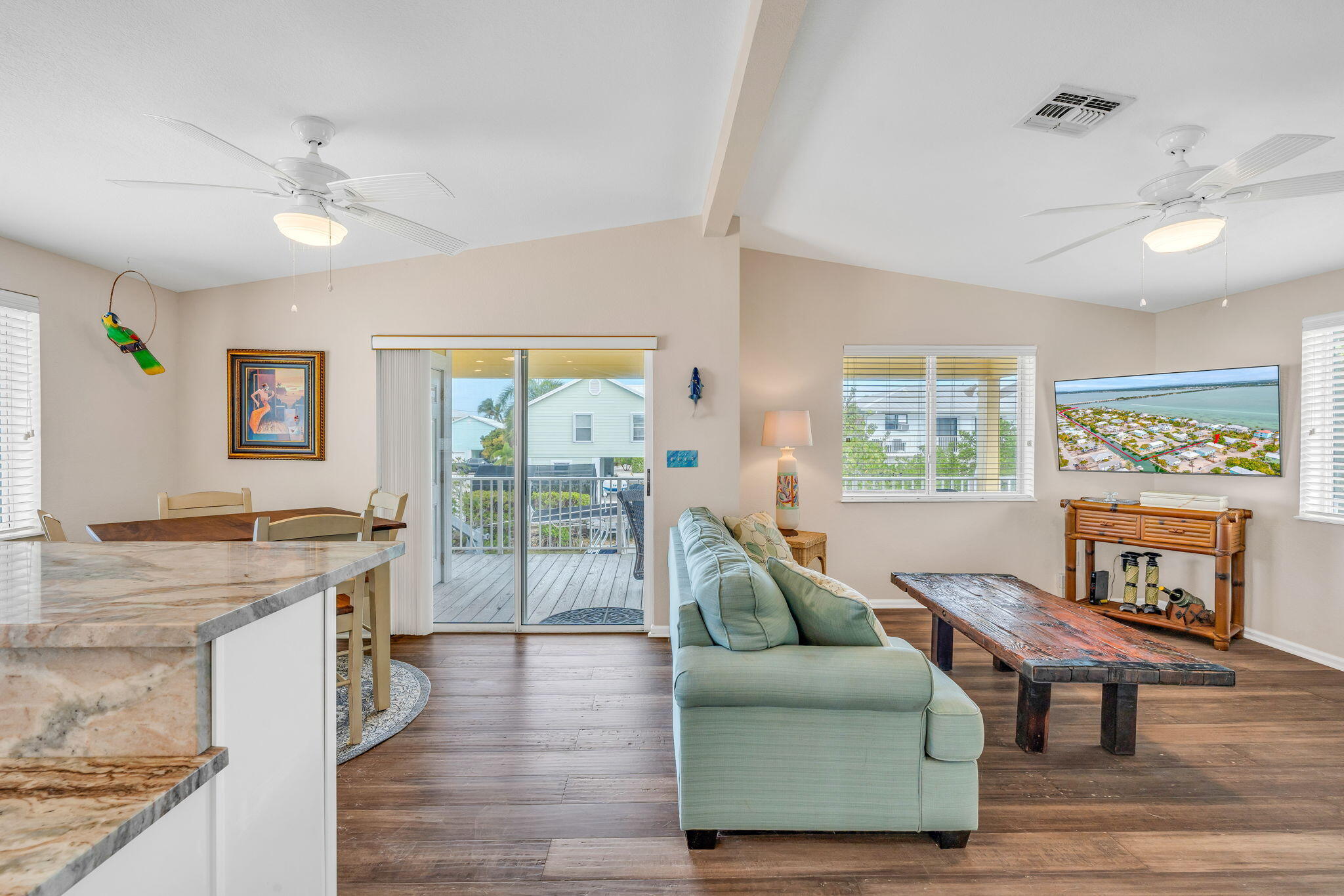 28571 Buccaneer Road Summerland Key, FL 33042 - Photo 10 of 40 a living room with furniture and a wooden floor