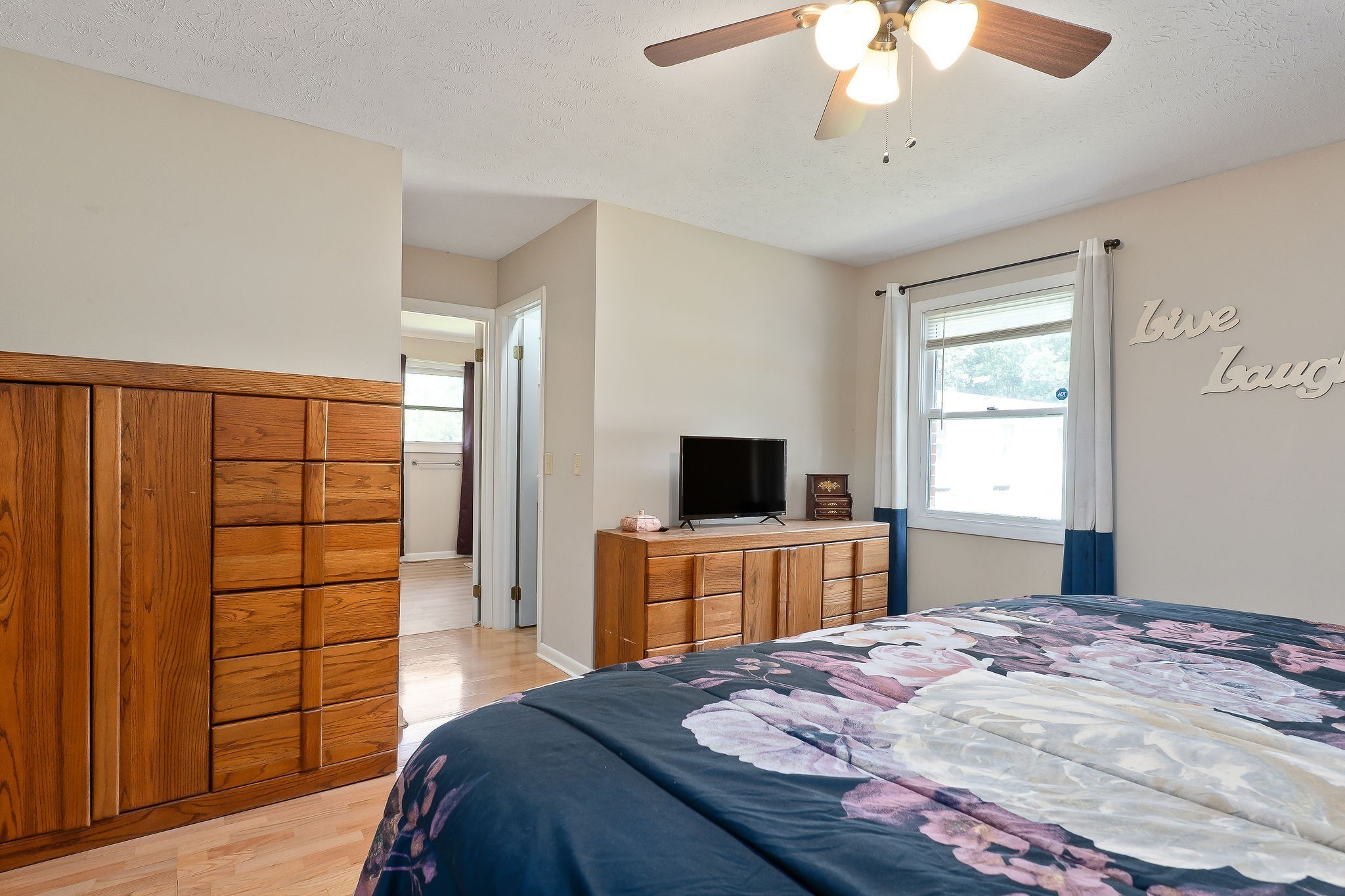 618 Cash Dollar Road Walling, TN 38587 - Photo 13 of 60 a bedroom with a bed and a flat screen tv