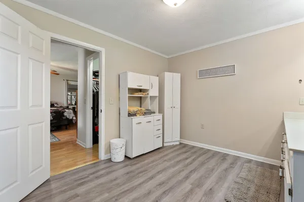 a view of a bathroom with a sink and a mirror