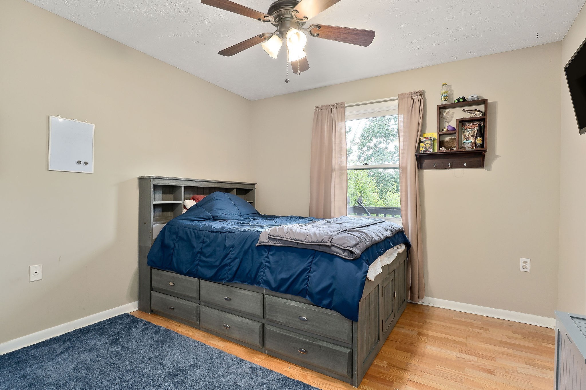 618 Cash Dollar Road Walling, TN 38587 - Photo 2 of 60 a bedroom with a bed and a window