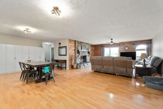 a view of a room with a large window walk in closet and bedroom