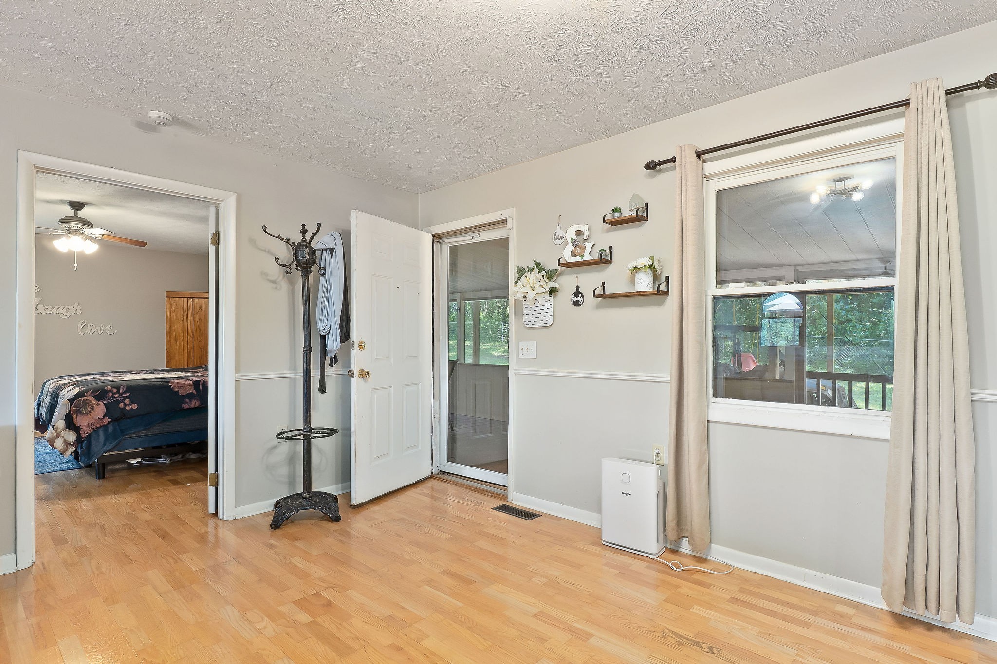 618 Cash Dollar Road Walling, TN 38587 - Photo 23 of 60 a view of a room with a large window walk in closet and bedroom