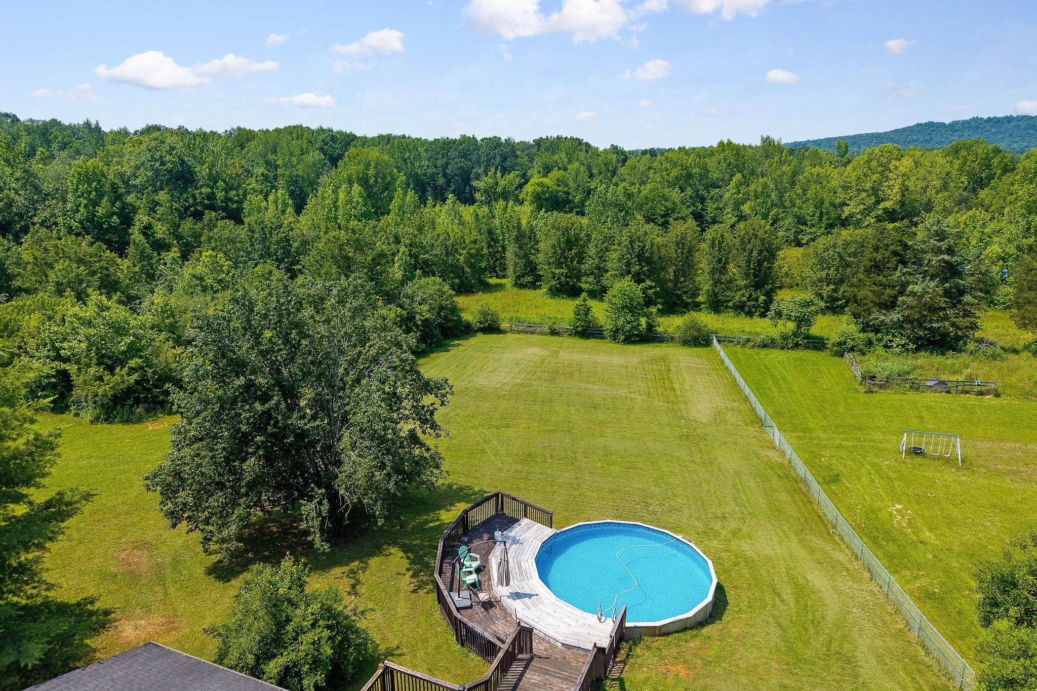 618 Cash Dollar Road Walling, TN 38587 - Photo 27 of 60 a view of a swimming pool with a yard and outdoor seating