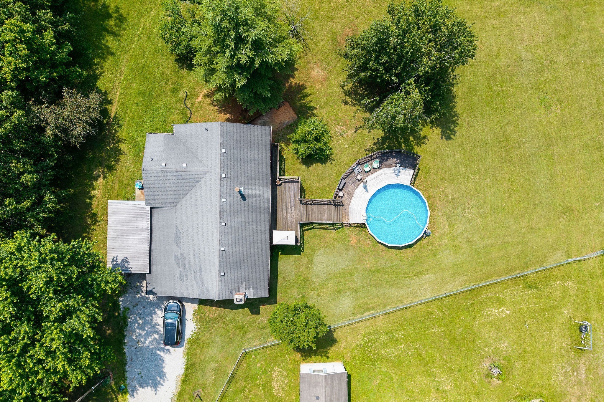 618 Cash Dollar Road Walling, TN 38587 - Photo 28 of 60 a aerial view of a house with swimming pool and large trees