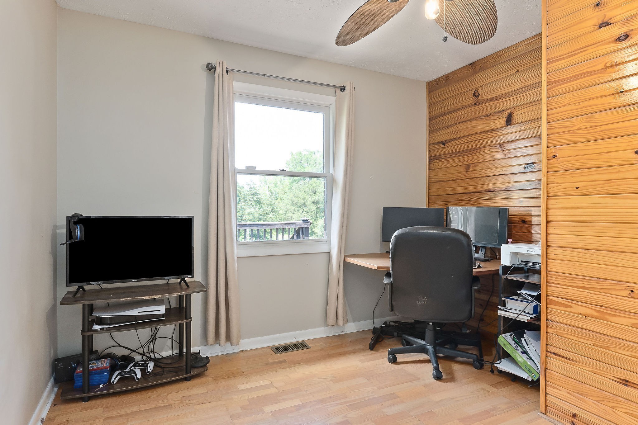 618 Cash Dollar Road Walling, TN 38587 - Photo 3 of 60 a view of a workspace with furniture and a window
