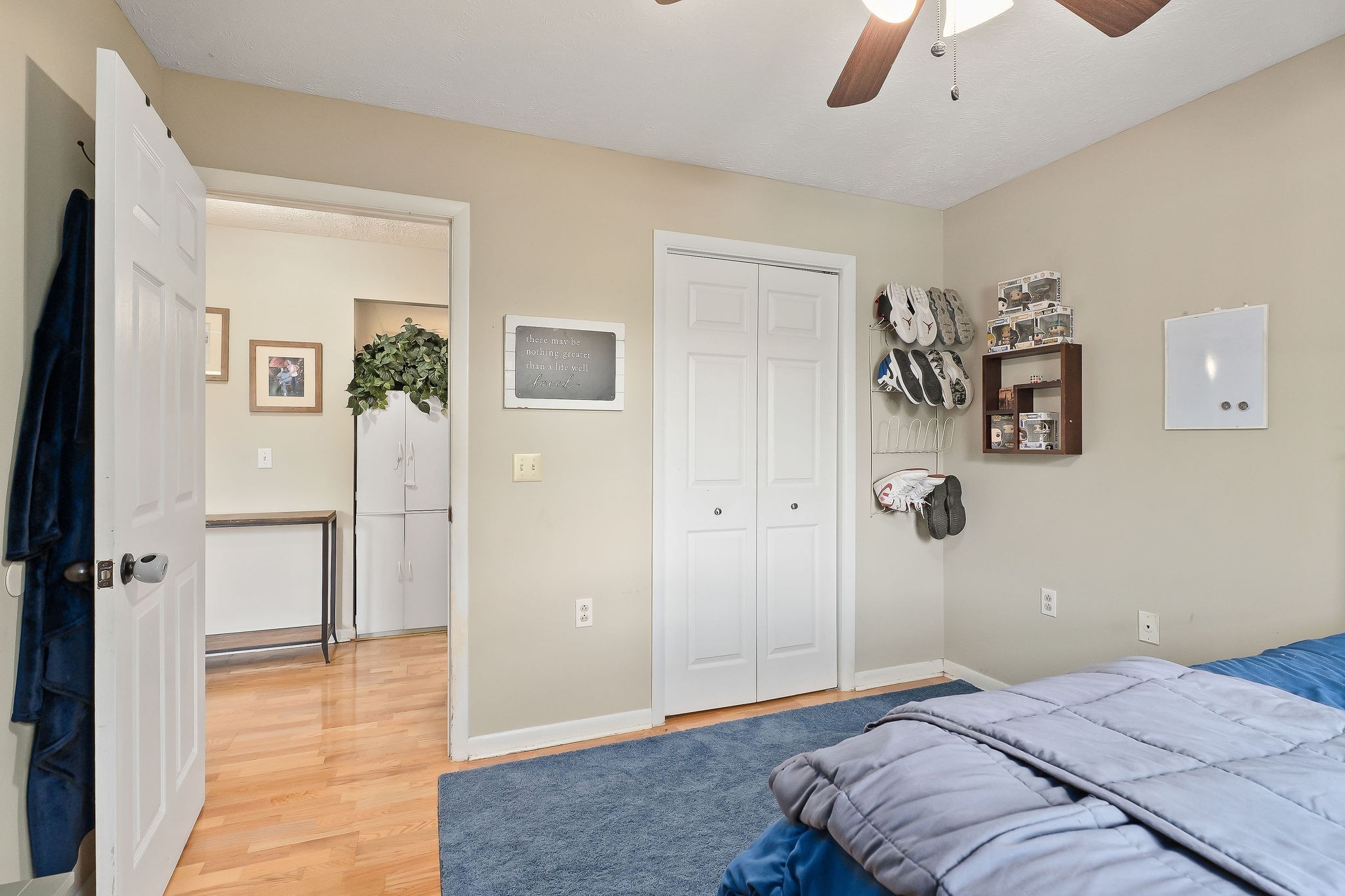 618 Cash Dollar Road Walling, TN 38587 - Photo 4 of 60 a bedroom with a bed and a chandelier