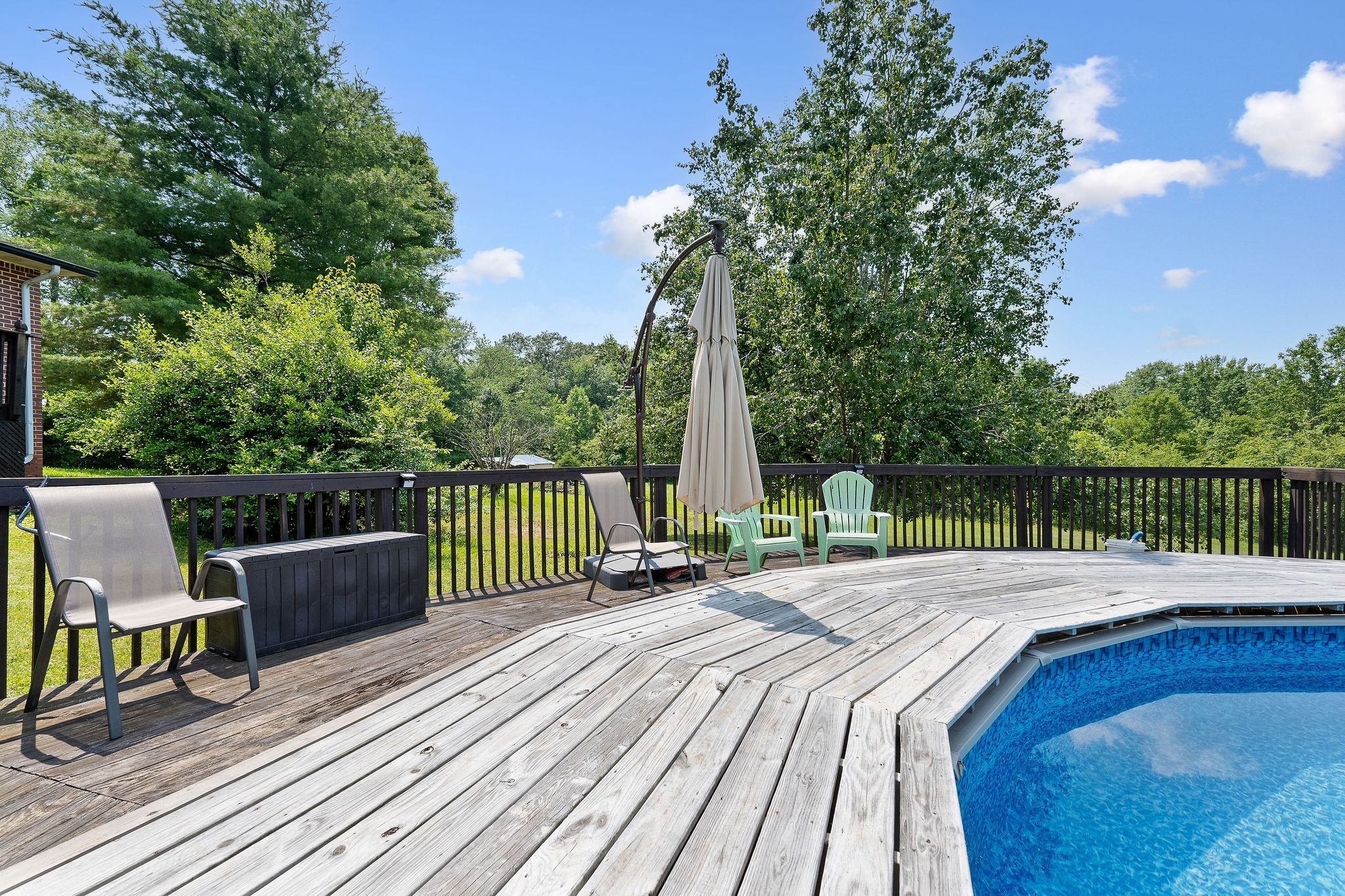 618 Cash Dollar Road Walling, TN 38587 - Photo 43 of 60 a view of balcony with wooden floor and outdoor seating