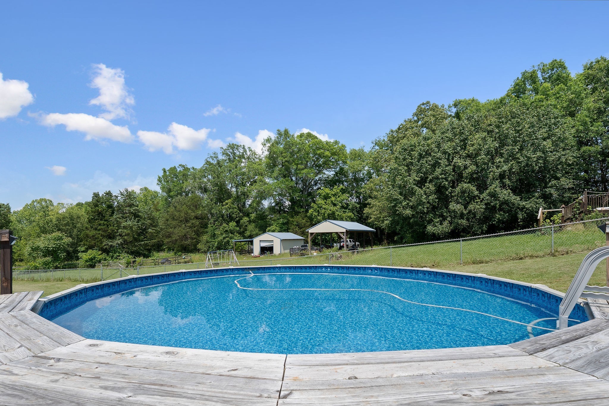 618 Cash Dollar Road Walling, TN 38587 - Photo 44 of 60 a view of a swimming pool with a yard