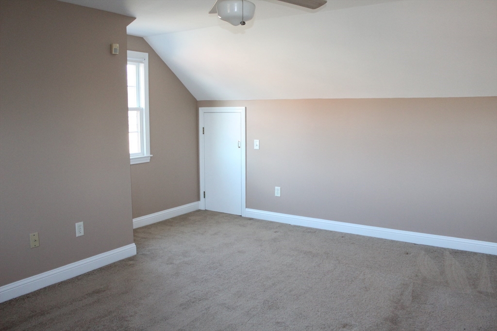 700 Wrentham Road, Unit 2 Bellingham, MA 02019 - Photo 18 of 23 an empty room with window