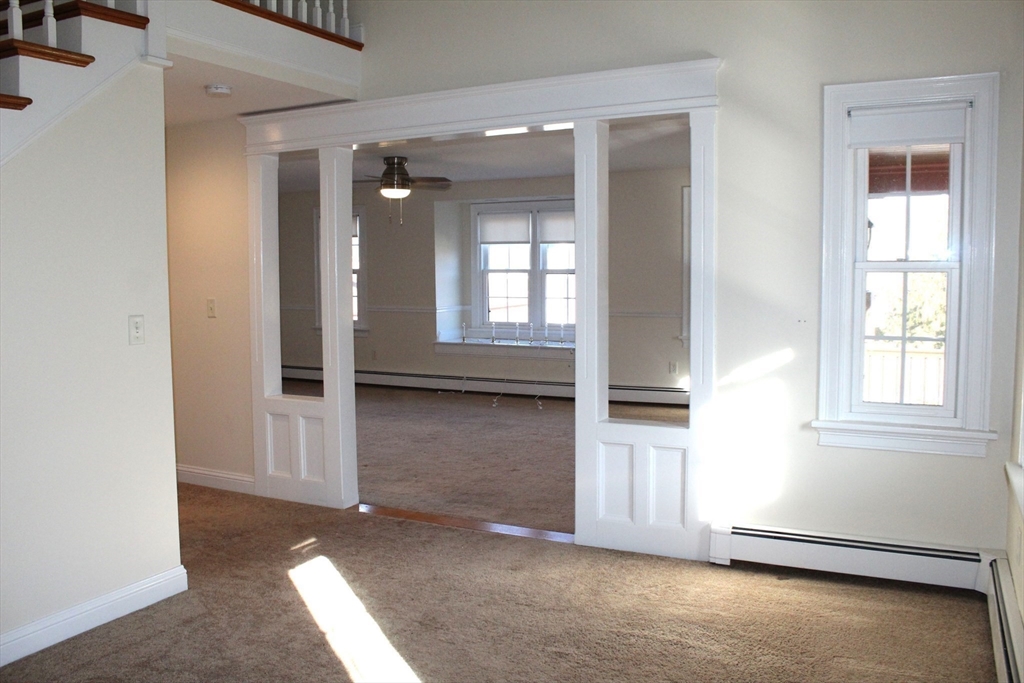 700 Wrentham Road, Unit 2 Bellingham, MA 02019 - Photo 10 of 23 an empty room with windows