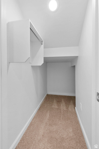 1302 East 1670th North, Unit 908 Payson, UT 84651 - Photo 8 of 21 Walk in closet featuring light colored carpet
