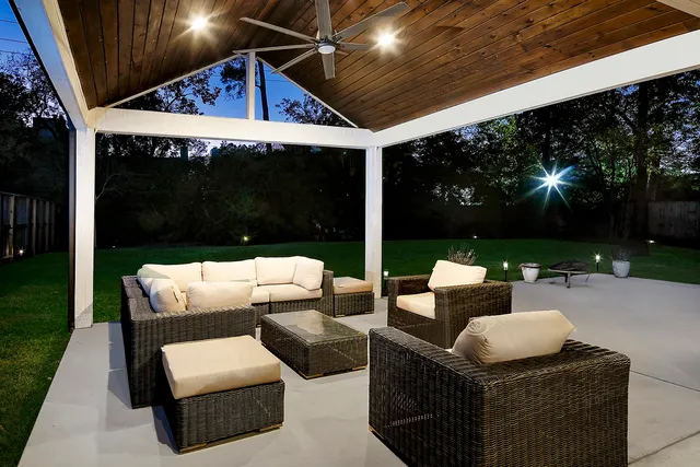 a backyard of a house with lots of green space