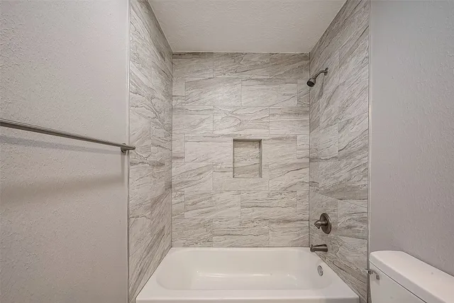 a bathroom with a bathtub