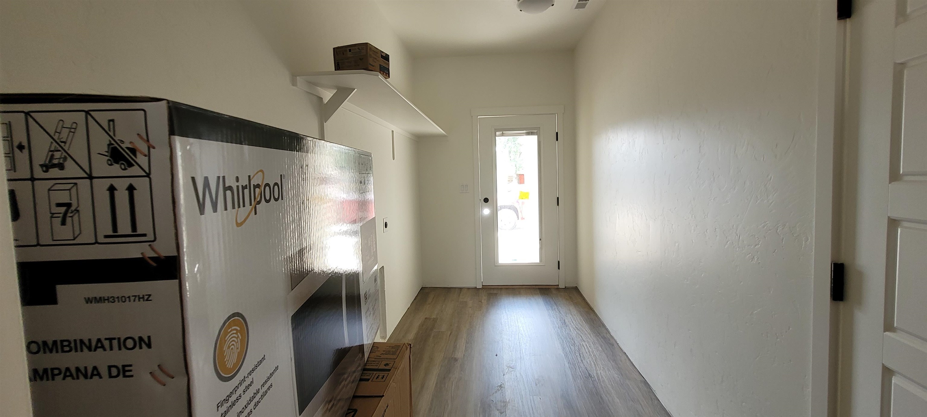 1644 Tungsten Way Fruita, CO 81521 - Photo 3 of 17 a view of entryway with furniture and wooden floor