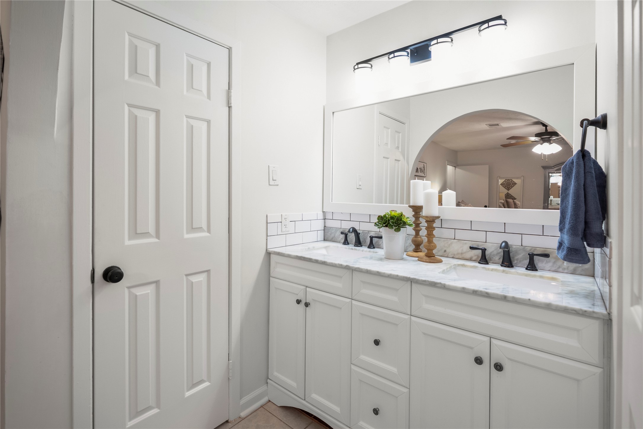 12224 Gun Oak Place Spring, TX 77380 - Photo 25 of 43 Functional and spacious primary bath designed to support both routine and relaxation. Primary Shower located in the door to the left.