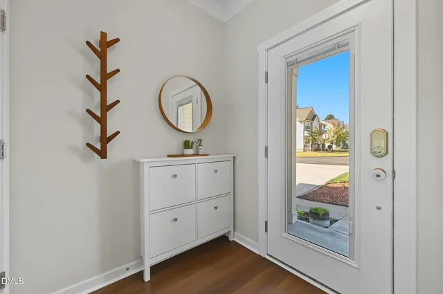 a bathroom with a toilet a sink and a mirror