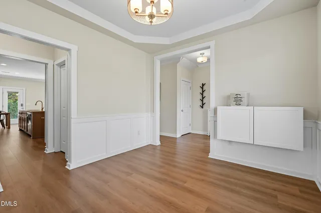 a view of a livingroom with wooden floor