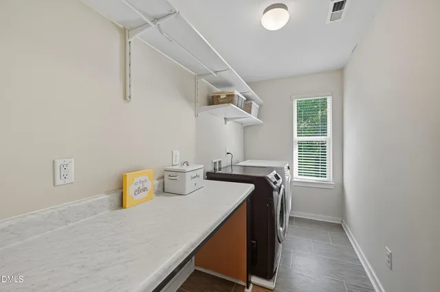 a view of kitchen and windows