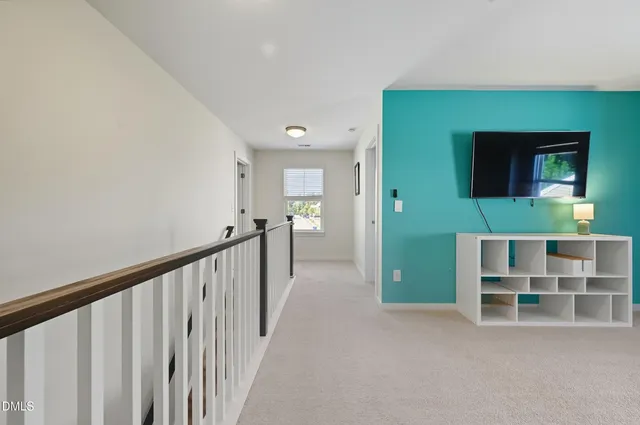 a view of a livingroom with furniture and window