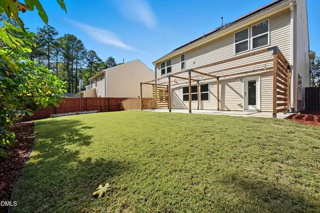 a front view of a house with yard