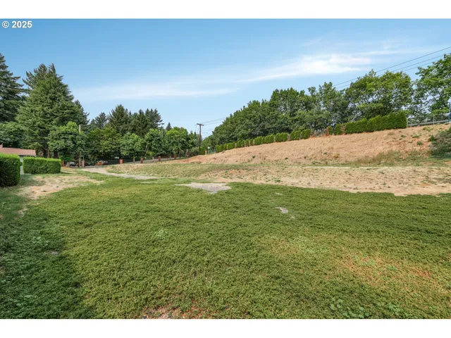 a view of beach and yard