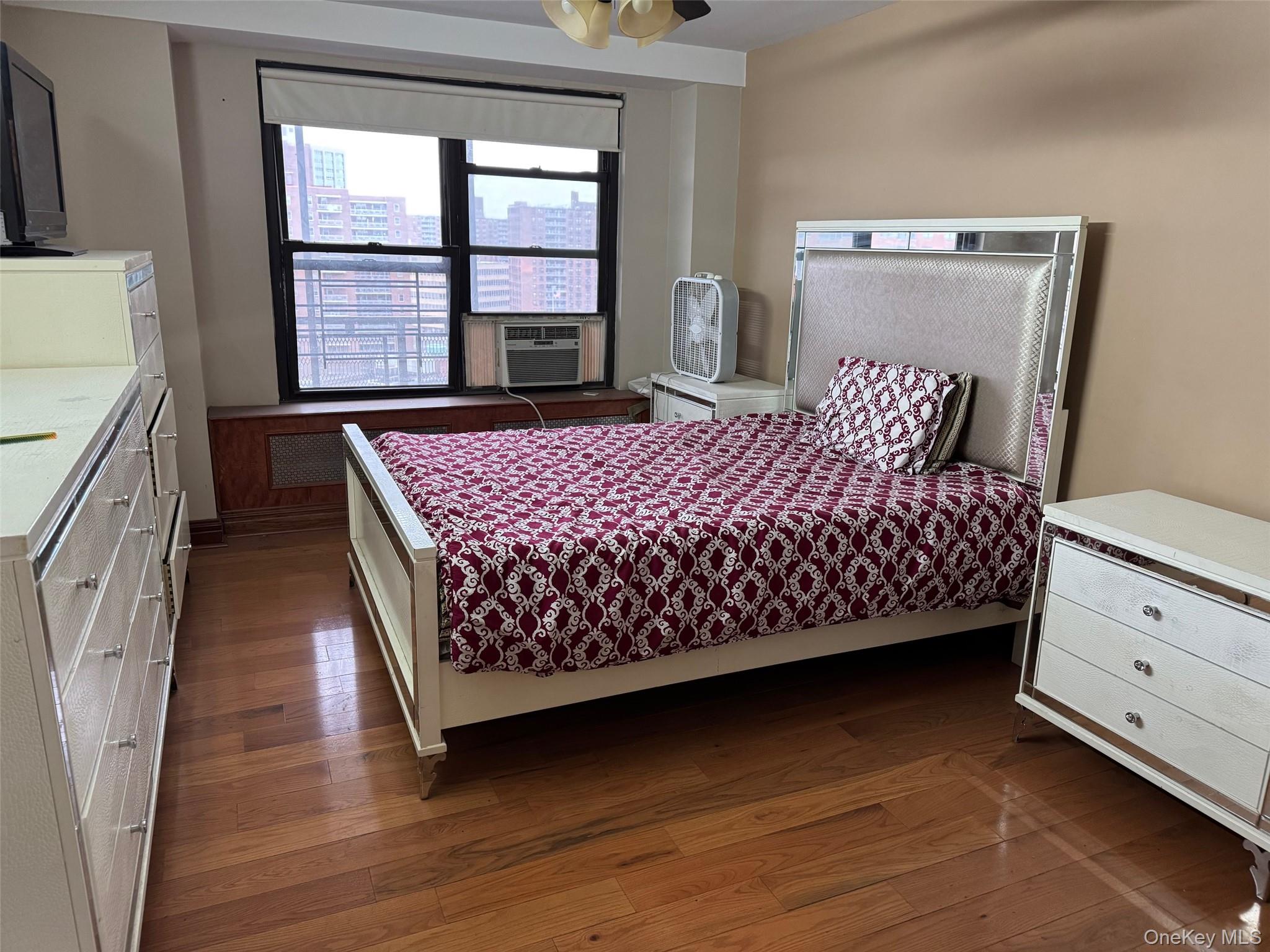 61-55 98th Street, Unit 14L Queens, NY 11374 - Photo 11 of 18 Bedroom featuring dark hardwood / wood-style floors