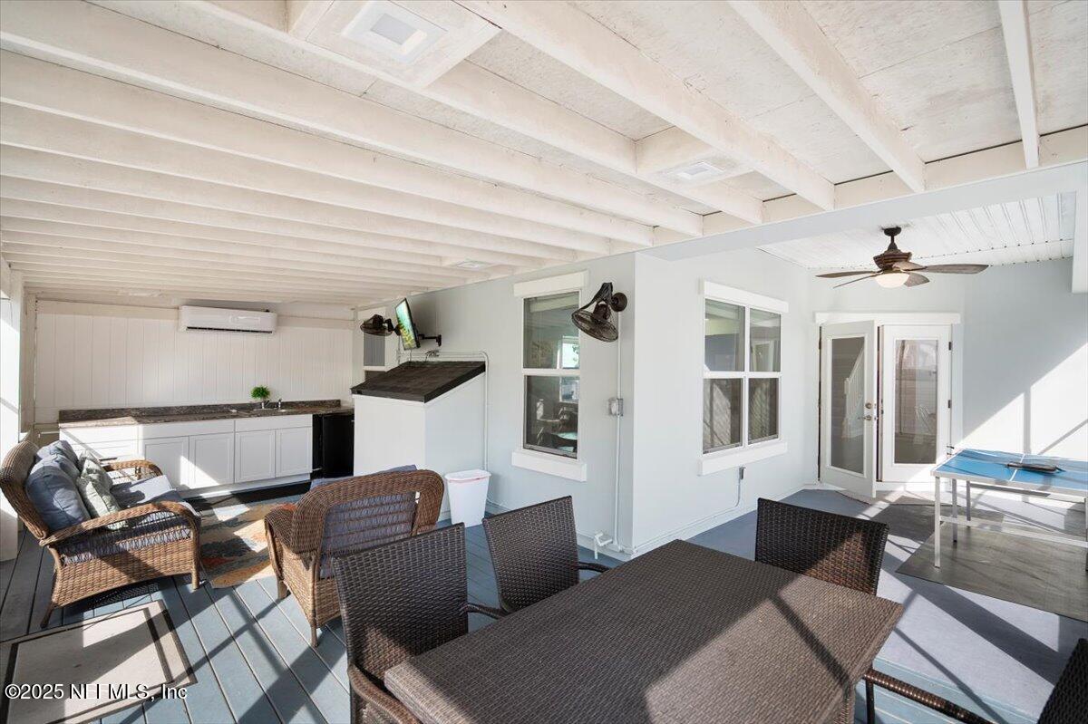 53 Menendez Road St. Augustine, FL 32080 - Photo 26 of 33 a living room with furniture and a window
