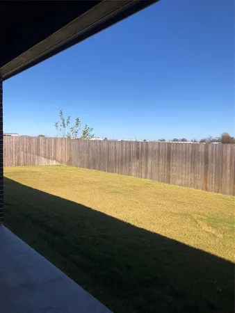 a view of an outdoor space and a lake view