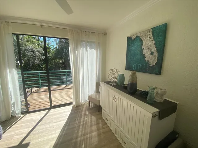 a bathroom with a sink and a large window