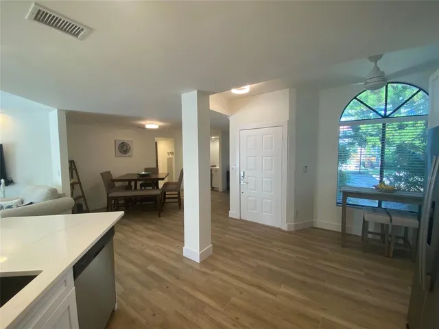 a view of a kitchen and dining room
