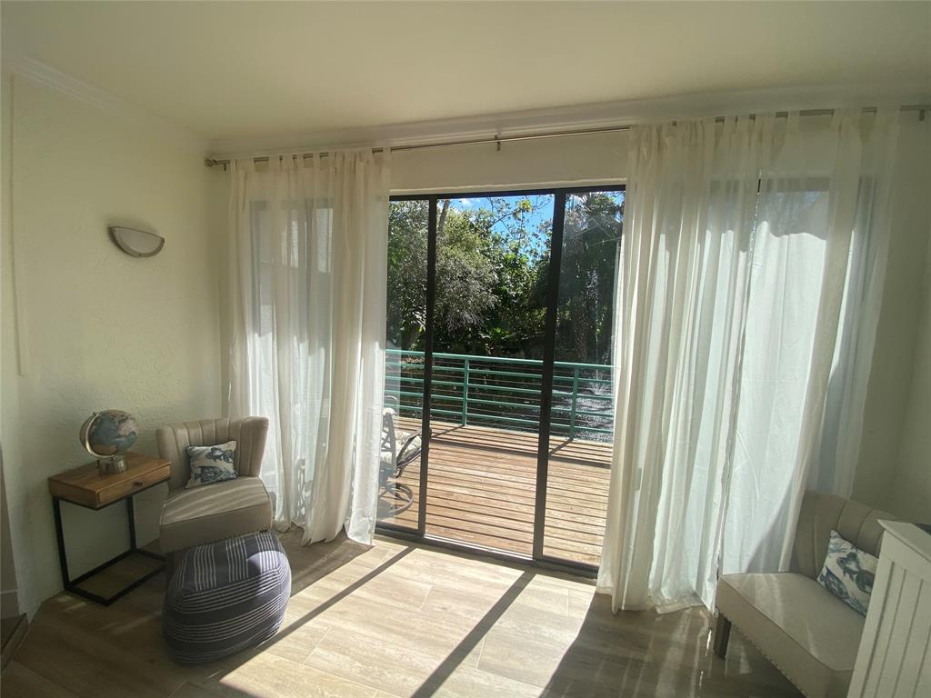 2286 Anchorage Lane, Unit A Naples, FL 34104 - Photo 28 of 41 a bedroom with furniture and a window